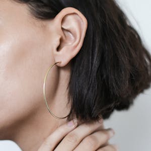 2.5" Classic Gold Hoops on model