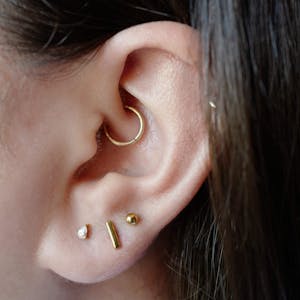 Celestial Dewdrop Nap Earrings in Gold on model