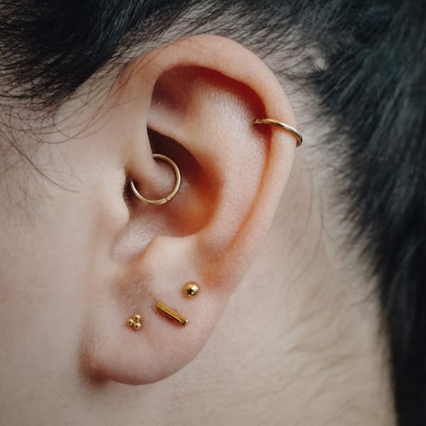 Geometric Nap Earrings Trio in Gold on model