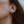 Load image into Gallery viewer, Comet Twirl Earrings in Sterling Silver on model