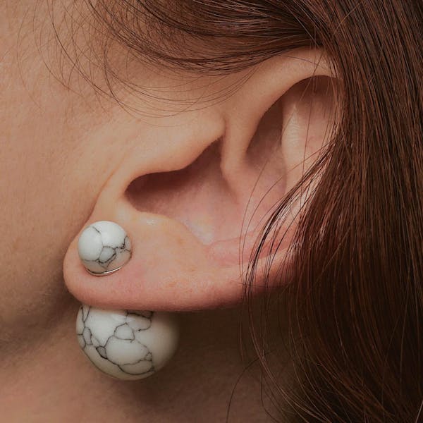 Isabelle Pearl Earrings in Marble on model