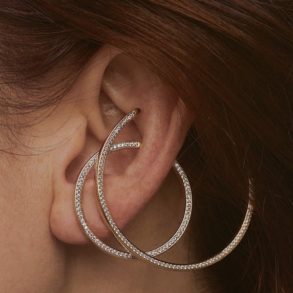 Celestial Illusion Hoops in Sterling Silver on model