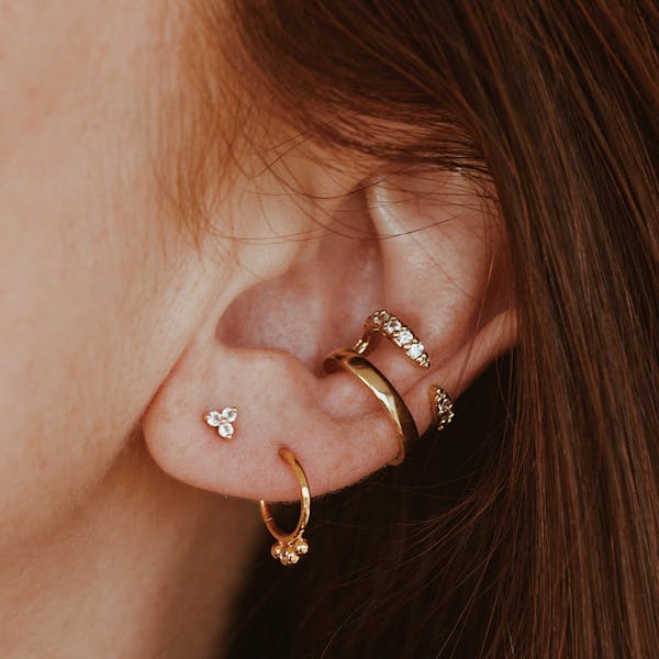 Mini Crystal Trinity Nap Earrings on model