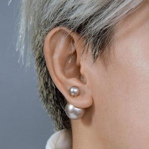 Isabelle Pearl Earrings in Silver Gray on model